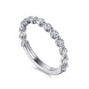 14K .84CTW Single Prong Set Diamond Band.