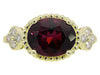 14K YG 3.37CT OVAL GARNET .22C