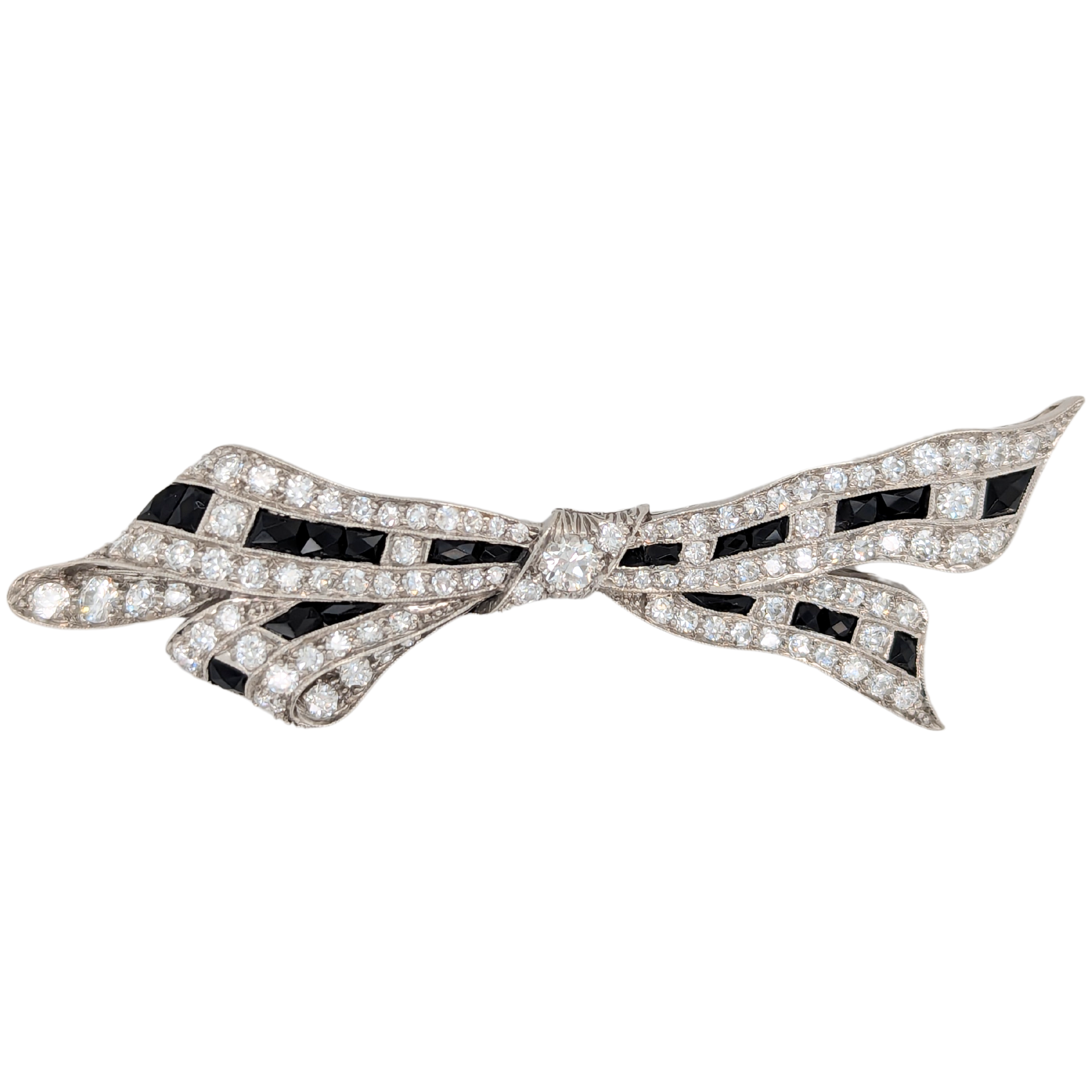 Estate: 18K Diamond and Onyx Bow Brooch