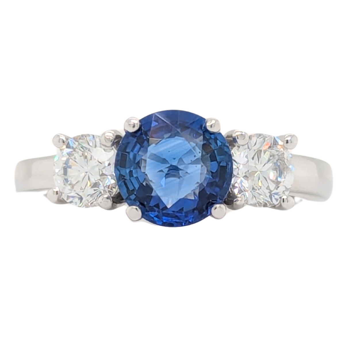 18K Blue Sapphire Three Stone Ring with .70CTW Diamond Accents