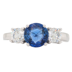 18K Blue Sapphire Three Stone Ring with .70CTW Diamond Accents