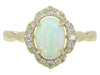 14K YG .87CT OVAL OPAL .20CTW