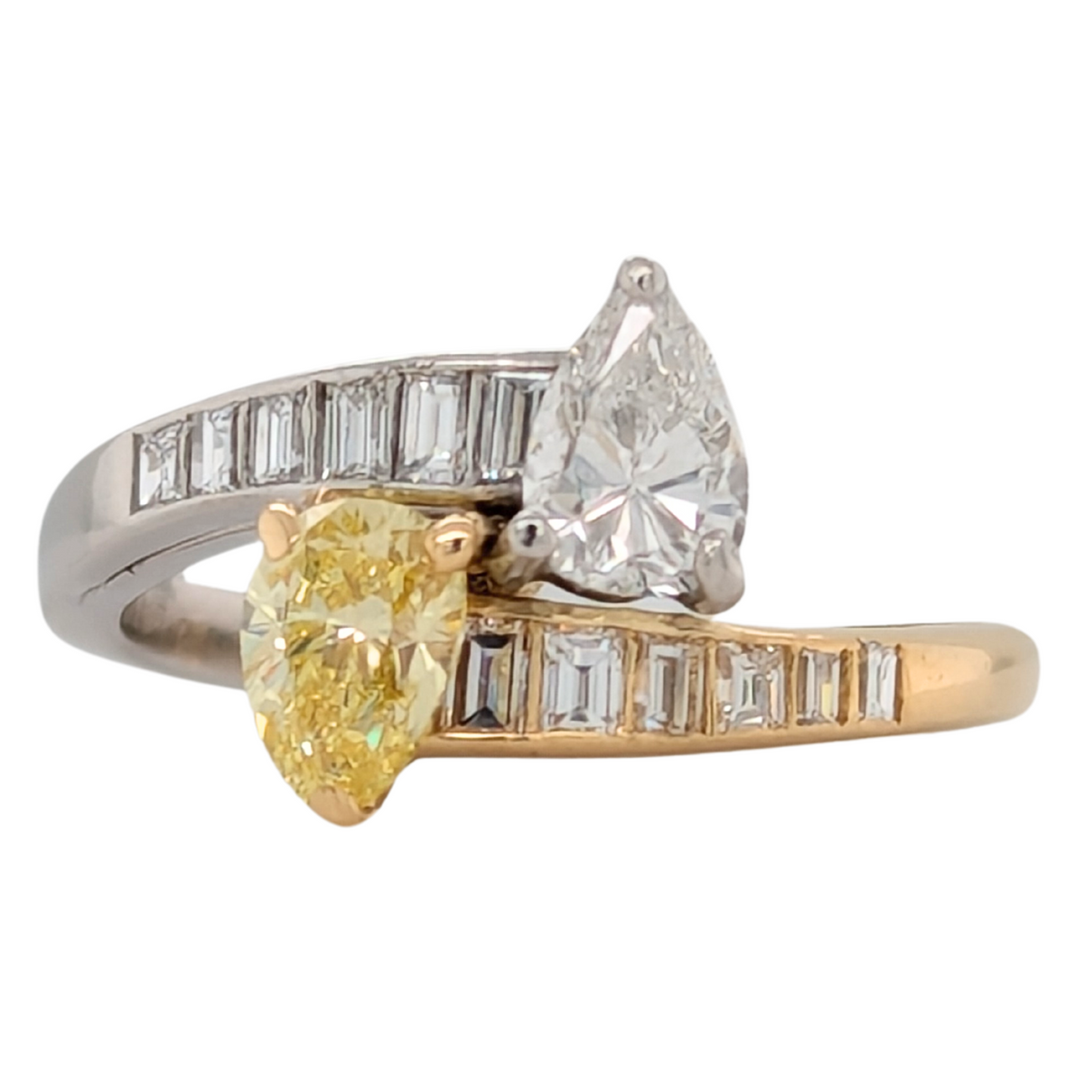 Estate: 18K Two Tone Pear Shape Diamond Bypass Ring